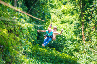 Lady Riding With A Guide Superman Style Tizati Zip Line Rincon De La Vieja
 - Costa Rica