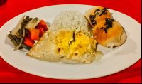        fish rice and sautee vegetables at la leona eco lodge 
  - Costa Rica