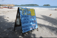 el ancla sign on beach 
 - Costa Rica