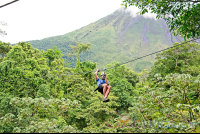 Zip Lining With Arenal Volcano Base In The Background Los Canones Canopy Tour La Fortuna
 - Costa Rica