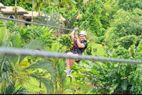 Flying Above The Resort Los Lagos On A Zip Line Los Canones Canopy Tour La Fortuna
 - Costa Rica