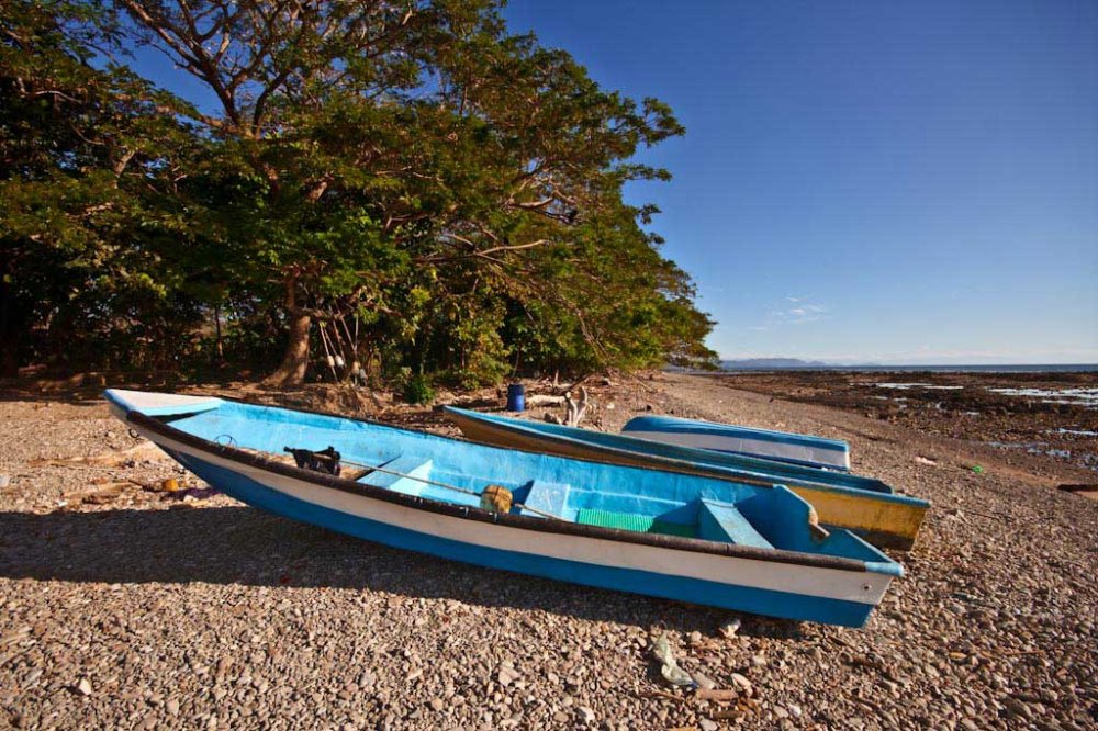        blue boat beach cabuya
  - Costa Rica
