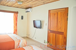 Premium Room Bedroom Tv Ac Unit And Door Los Lagos Resort
 - Costa Rica