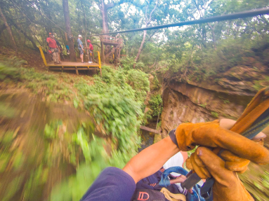 Riding Last Cable To Land Platform White River Canyon Zip Line Rincon De La Vieja
 - Costa Rica