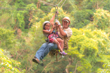 Young Girl Riding With A Guide Tizati Zip Line Rincon De La Vieja
 - Costa Rica