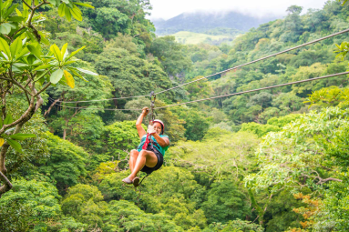 Lady On A Forested Cable Tizati Zip Line Ricon De La Vieja
 - Costa Rica