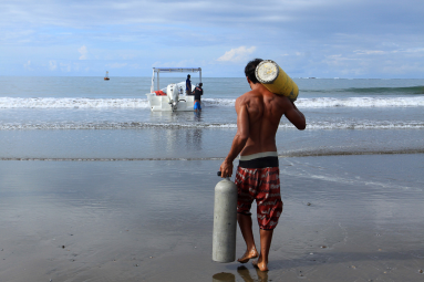 dominical surf dive snorkel carrying tanks 
 - Costa Rica