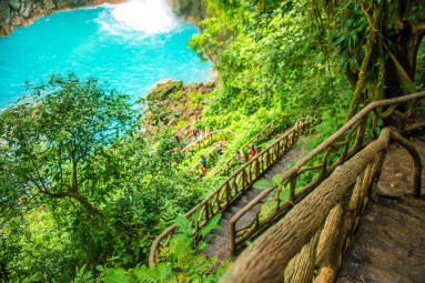 Step Trail Railing With The View Of The Blue Pool Celeteste River Waterfall Tour
 - Costa Rica