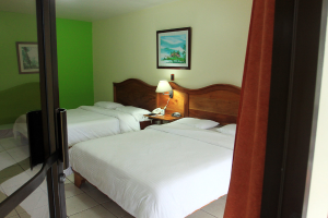 hotel lavas tacotal junior suite bed 
 - Costa Rica