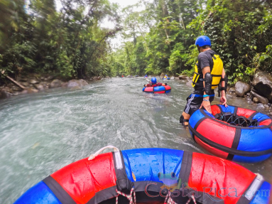 Tubing In A Section Of Calm Water Blue River Rincon De La Vieja
 - Costa Rica