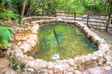 View Of Cement Pool With A Fence Hot Springs Pools Rincon De La Vieja
 - Costa Rica