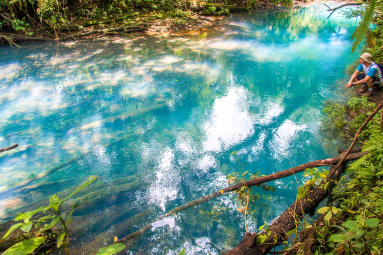 A Man Looking At The Blue River
 - Costa Rica