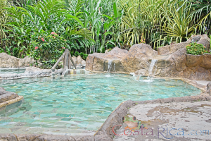 Los Lagos Hot Springs Cement Pool With Small Waterfall
 - Costa Rica